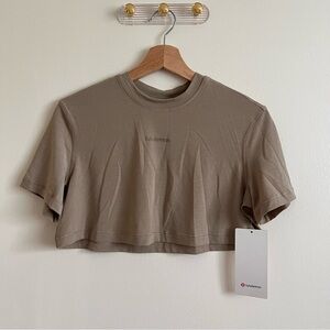Lululemon Jersey Training Super Cropped Short Sleeve Shirt
Sheer Oak
Size 2